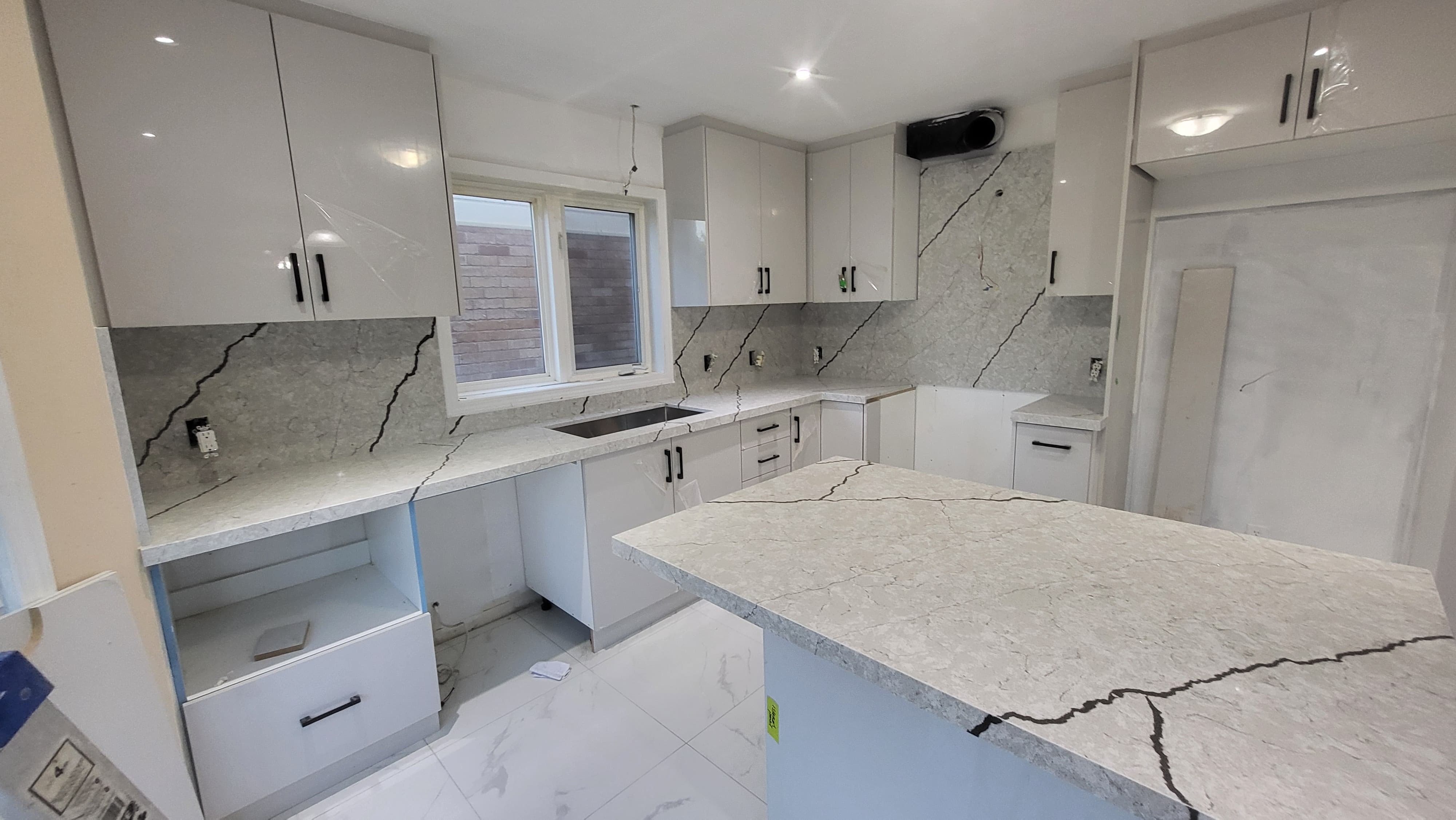 Elegant Basement Kitchen with Marble Countertop